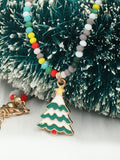 Collier de perles de cristal avec pendentif cloche de Noël