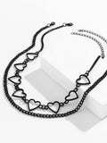 Nvuvu Herz-Halskette mit geometrischem Ausschnitt