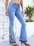 Go-Getter Flare Jeans mit leichtem, hohem Bund und Sonnenblumenmuster